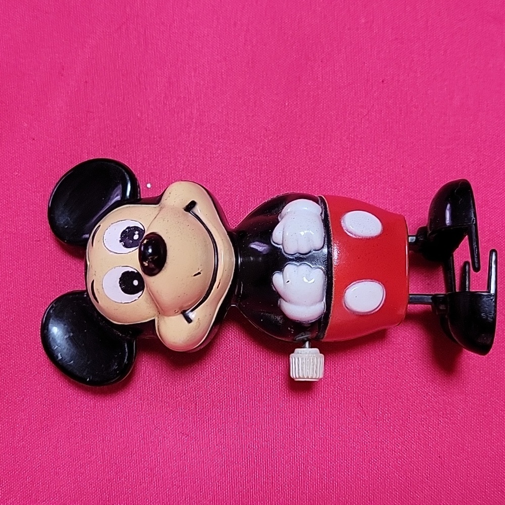 Mickey mouse whind up antique toy.